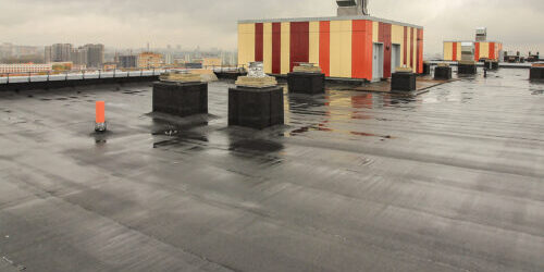 Waterproofing and rejuvenating flat roof membrane